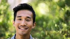 A close-up of a person smiling.